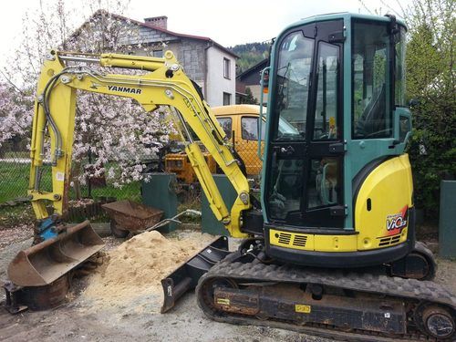 mini digger parked up at office